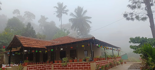 Deep timber veranda overlooking hills